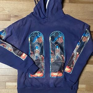 Who Decides War Graphic Hoodie with Stained Glass Design